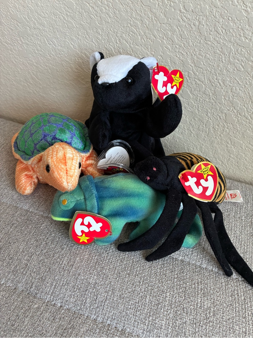 Ty Beanie Baby 4-piece Lot Peekaboo Turtle, Spinner Spider, Stinky Skunk, Iggy